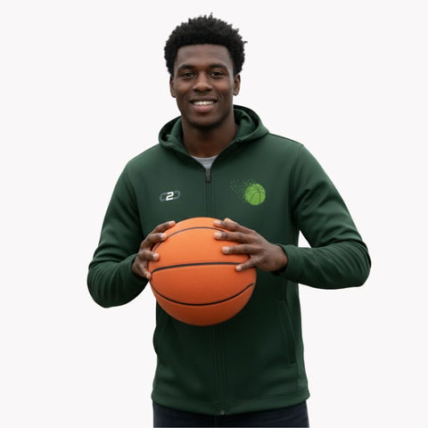A person smiling and holding an basketball with both hands, wearing a Bottle Green Glide SlimFit HP Tech zip hoodie.